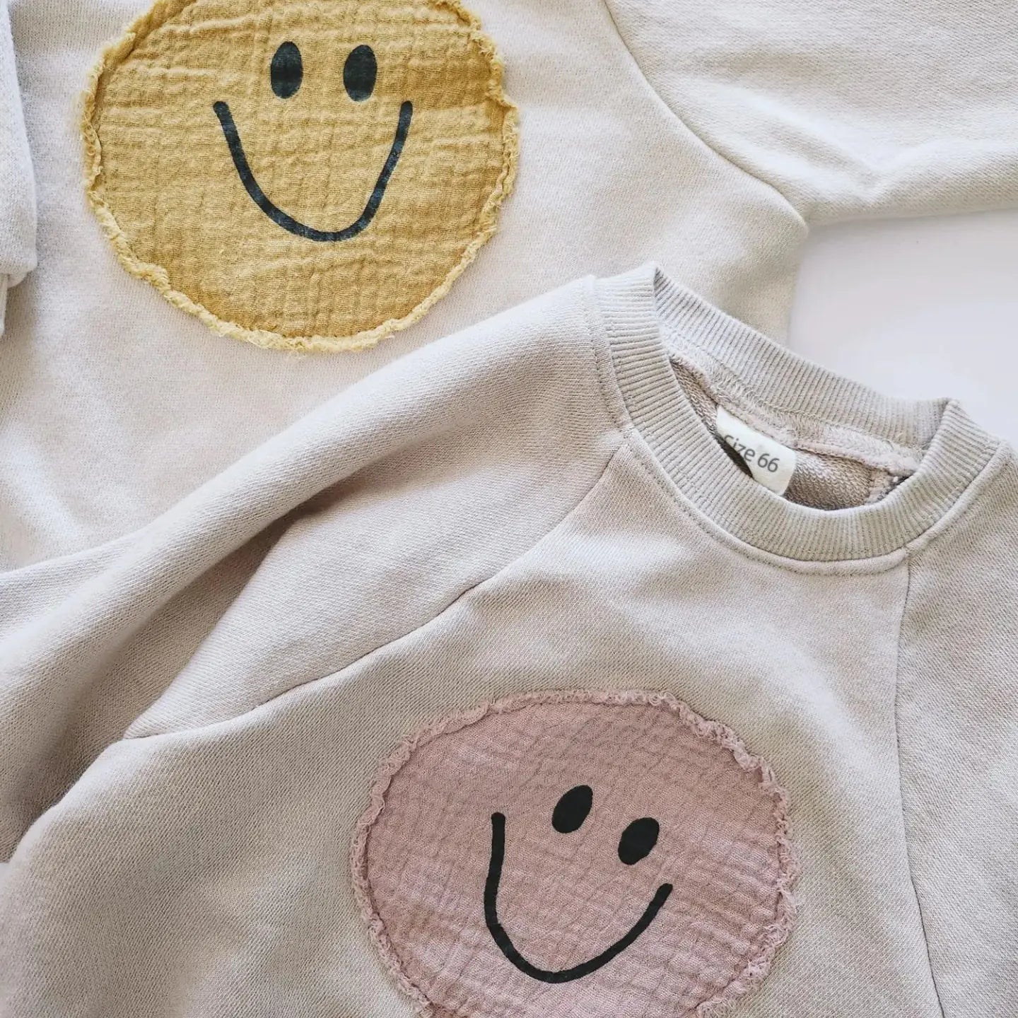 OMNI™ Smiley Face Sweatshirt Baby Romper